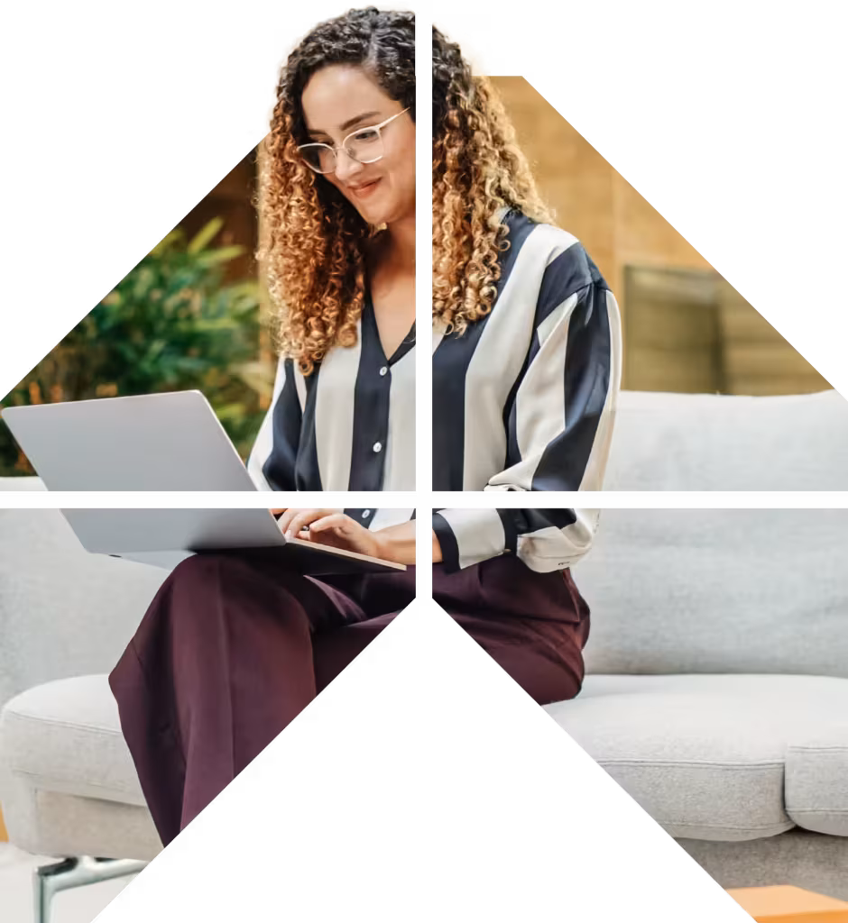 Woman on laptop happy with the support her team has been given
